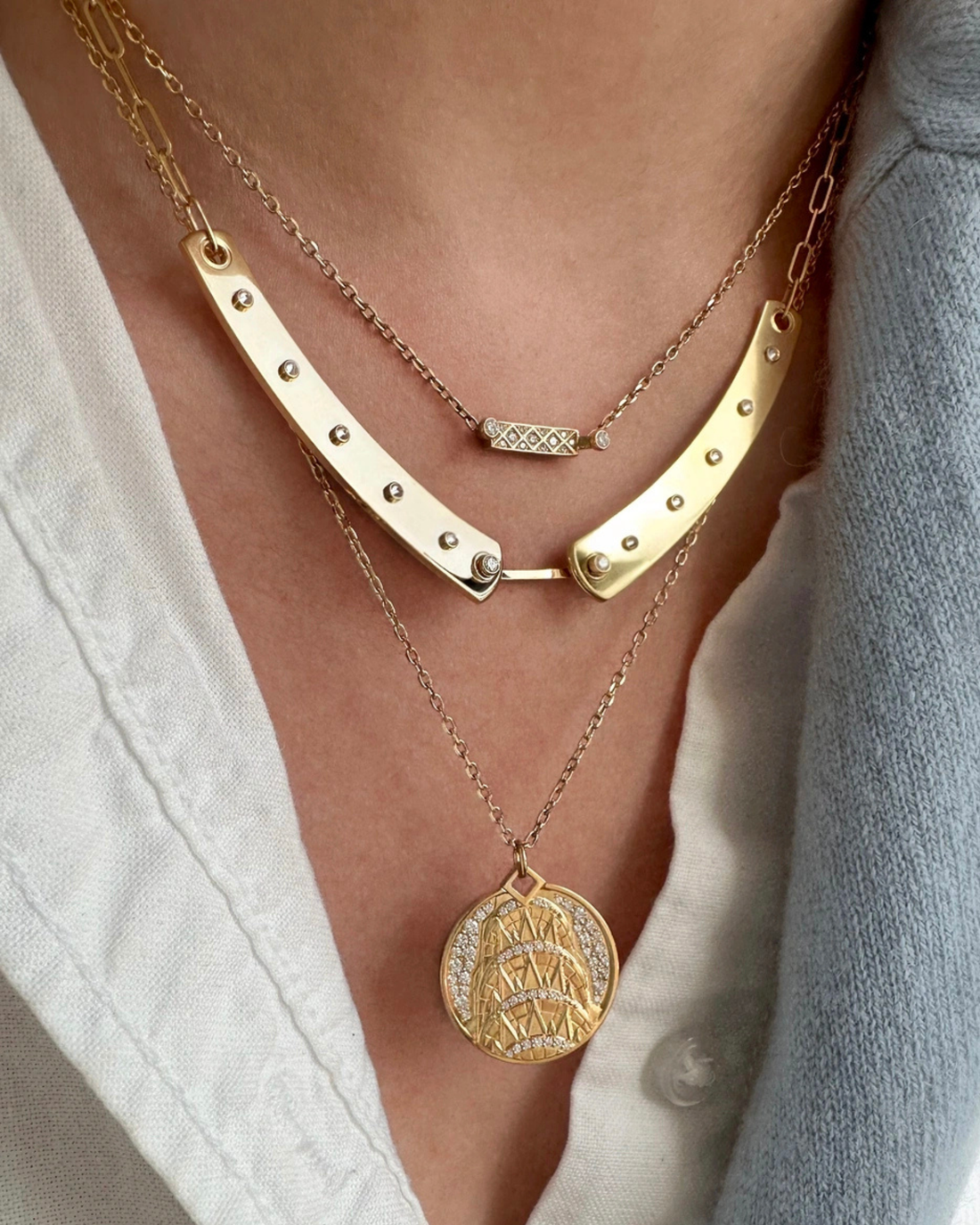 layers of 3 necklaces in 18k gold